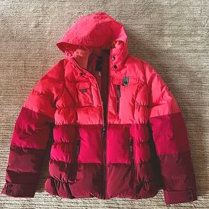 Worn twice, size 12, beautiful colors with great pockets for skiing , Obermeyer